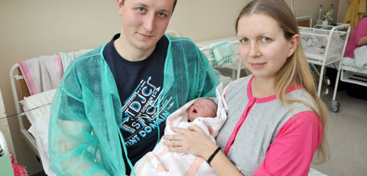 Kacperek Koszowski wraz z rodzicami 