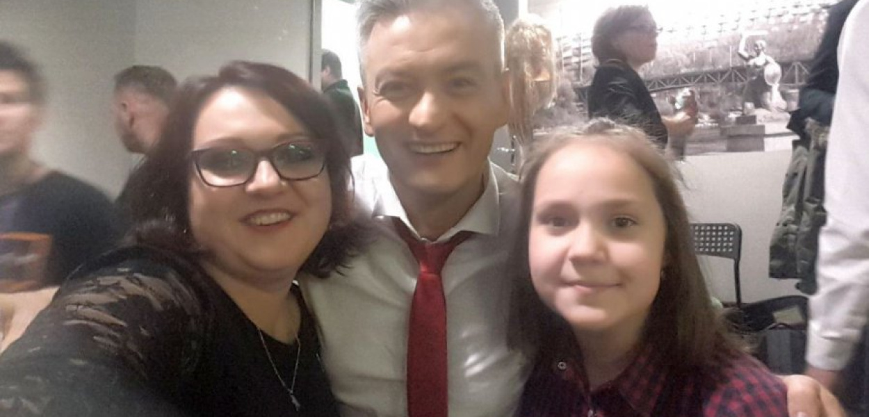 Anna Maria Noworyta z Robertem Biedroniem i swoją córką Amelią